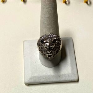 Rhodium plated . 925 sterling silver lion 🦁 cz man ring size.